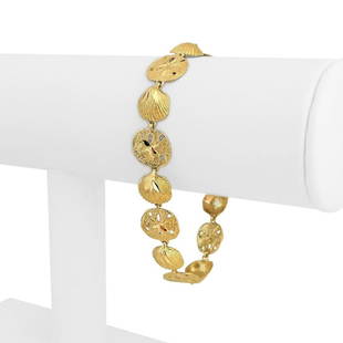14k Yellow Gold 12g Ladies 12mm Sea Shell and Sand Dollar Link Bracelet 7": Details Condition: Excellent Condition, Professionally Cleaned and Polished Metal: 14k Gold (Marked, and Professionally Tested) Weight: 12g Length: 7 Inches Width: 12mm Closure: Box Tab Insert