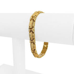14k Yellow Gold 10.6g Ladies Aurafin 9mm Fancy Link Bracelet Italy 7": Details Condition: Excellent Condition, Professionally Cleaned and Polished Metal: 14k Gold (Marked, and Professionally Tested) Weight: 10.6g Length: 7 Inches Width: 9mm Closure: Box Tab Insert