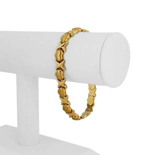 14k Yellow Gold 12.7g Ladies 8mm Hugs and Kisses XO Link Bracelet 7.5": Details Condition: Excellent Condition, Professionally Cleaned and Polished Metal: 14k Gold (Marked, and Professionally Tested) Weight: 12.7g Length: 7.5 Inches Width: 8mm Closure: Box Tab