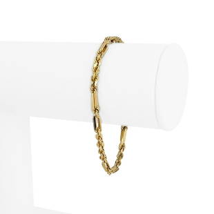 14k Yellow Gold 7g Ladies 3mm Fancy Open Link Rope Bracelet 7": Details Condition: Excellent Condition, Professionally Cleaned and Polished Metal: 14k Gold (Marked, and Professionally Tested) Weight: 7g Length: 7 Inches Width: 3mm Closure: Lobster Claw 