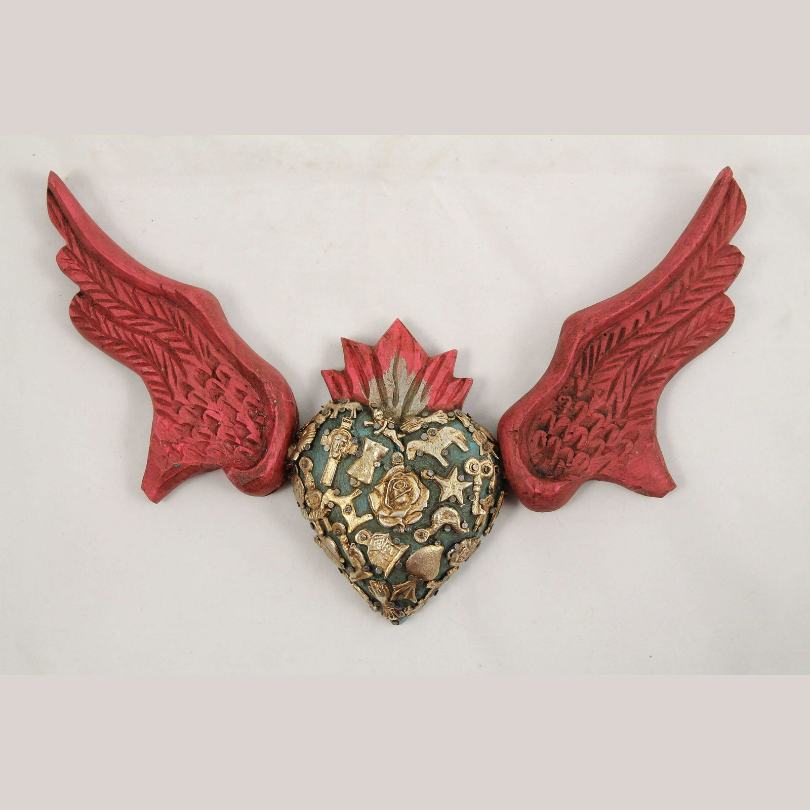 Wood Hanging Heart w Milagros Handmade/Painted Mexican Folk Art Décor Turq Rose: Large Wood Heart with many Milagros. Height- 7" Length- 11 1/2" Thick- 1 1/4" Jose Antonio Mejia Ornelas works along with his sons and daughters in a small work shop. Seeing them work in their shop is