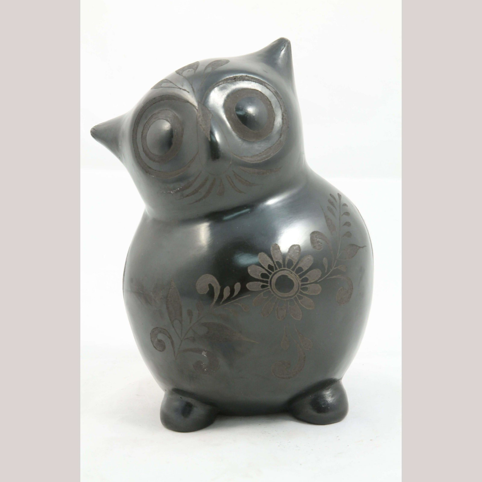 Ceramic Black Owl Mexican Folk Art Pottery Décor Incised Décor Eusebio M. Ortega: Ceramic Black Owl Measurements Height- 9 1/2" Wide-7" Deep- 6" This stunning black owl was hand made by Eusebio Mateos Ortega. This gorgeous owl was incised with beautiful designs, such as flowers and