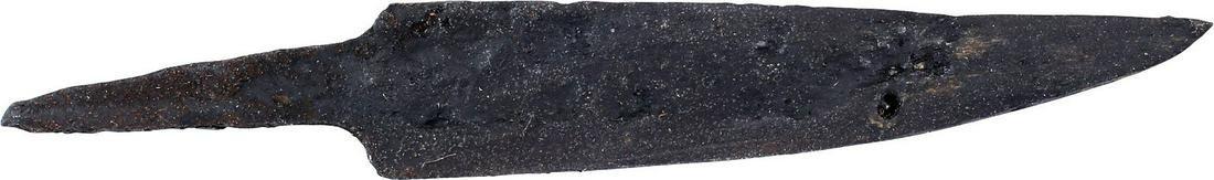 VIKING SIDE KNIFE OR POUCH KNIFE, 879-1067 AD: Cambridgeshire, England, 2 3/4" total length with the dropped point in the scramseax style. Particularly thin section for slashing, distinguishing it from a working knife. The edge delineated by the f