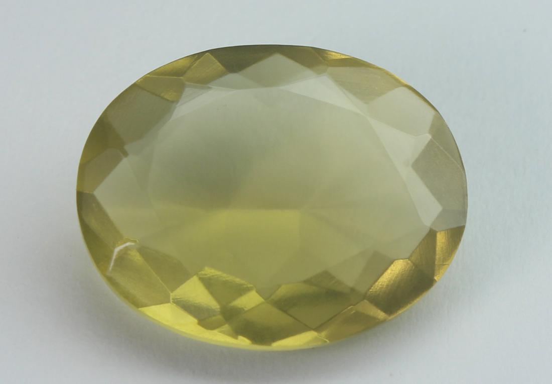 9.51 cts Natural Lemon Quartz: No Reserve! Title: 9.51 cts Natural Lemon Quartz Additional Information: Gemstone: Natural Lemon Quartz Origin: Africa Weight : 9.51 carats Measurements: 17.21x13.66x6.22 mm Shape / Cut : Oval Cut Col