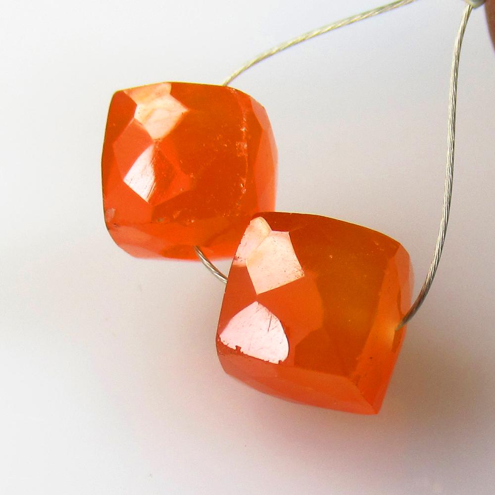 8.80 Ctw Natural 2 Drilled Orange Carnelian Square Beads: No Reserve! Title: 8.80 Ctw Natural 2 Drilled Orange Carnelian Square Beads Stone Clarity: Semi-Transparent Gemstones: Natural Carnelian Beads Carat Weights: 8.8 Size/Dimensions: 7.80 x 7.60 x 7.60 mm