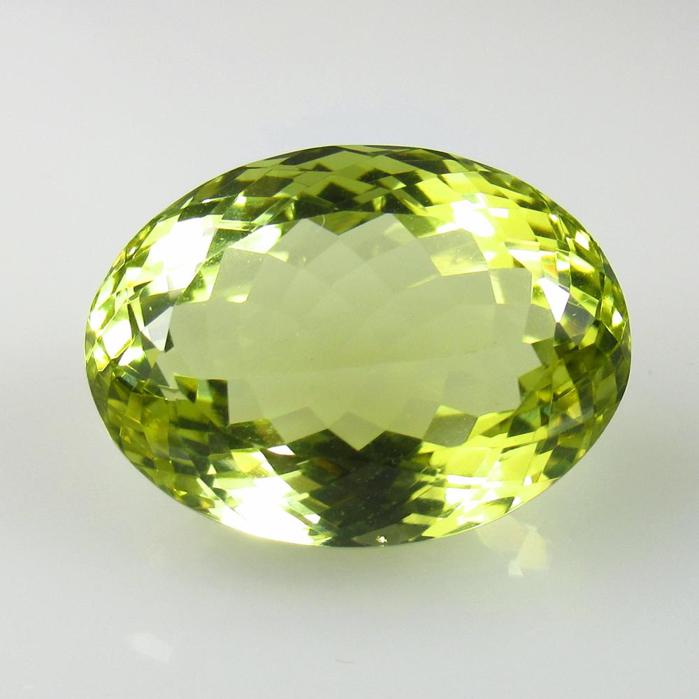 21.53 Ctw Natural Lemon Quartz Oval Cut: No Reserve! Title: 21.53 Ctw Natural Lemon Quartz Oval Cut Stone Clarity: VVS Gemstones: Natural Lemon Quartz Carat Weights: 21.53 Size/Dimensions: 20.10 x 15.30 x 10.80 mm Additional Information: Goo