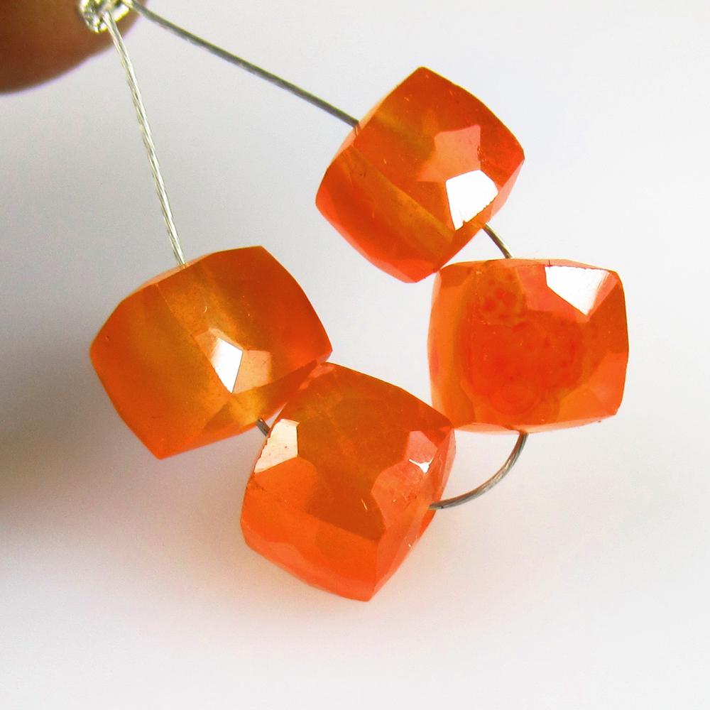 8.90 Ctw Natural 4 Drilled Orange Carnelian Square Beads: No Reserve! Title: 8.90 Ctw Natural 4 Drilled Orange Carnelian Square Beads Stone Clarity: Semi-Transparent Gemstones: Natural Carnelian Beads Carat Weights: 8.9 Size/Dimensions: 5.9x5.6 - 6.7x6.3 mm 