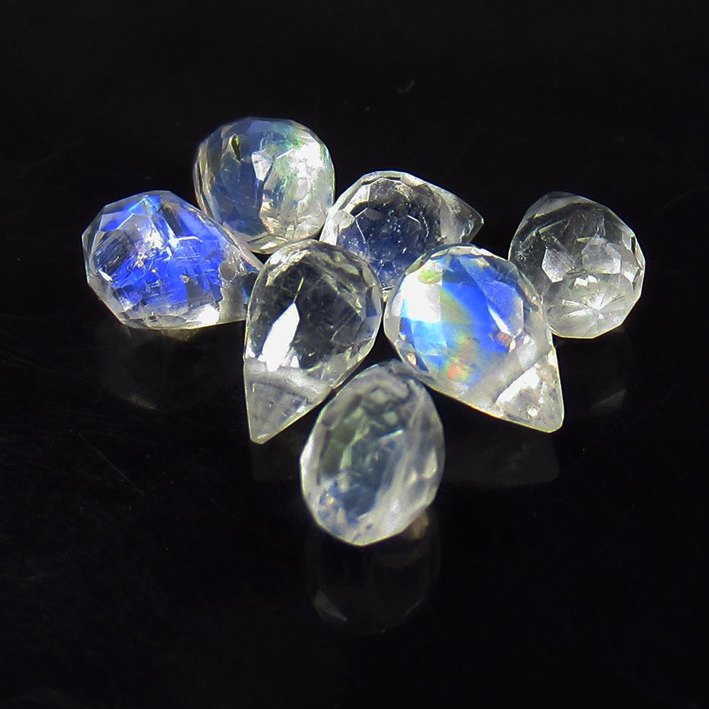 4.17 Ctw Natural 7 Blue Moonstone Pear Drop Beads: No Reserve! Title: 4.17 Ctw Natural 7 Blue Moonstone Pear Drop Beads Stone Clarity: Translucent Gemstones: Natural Moonstone Beads Carat Weights: 4.17 Size/Dimensions: 5.5x3.9 - 6.5x4.4 mm / 7 Pc's Ad