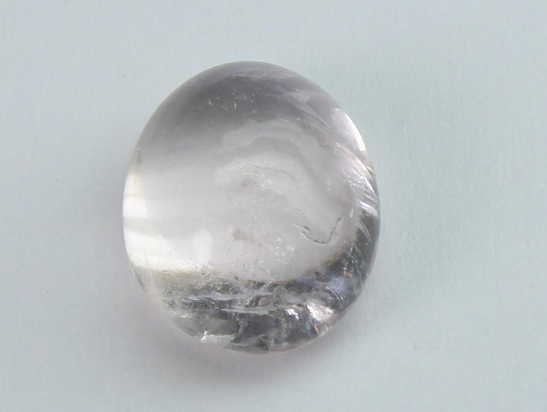 2.52 cts Natural Morganite: No Reserve! Title: 2.52 cts Natural Morganite Additional Information: Gemstone : Natural Morganite Shape and Cut : Oval Cabochon Weight : 2.52 carats Measurements : 9.56x7.70x4.71 mm Color : Peach Tra