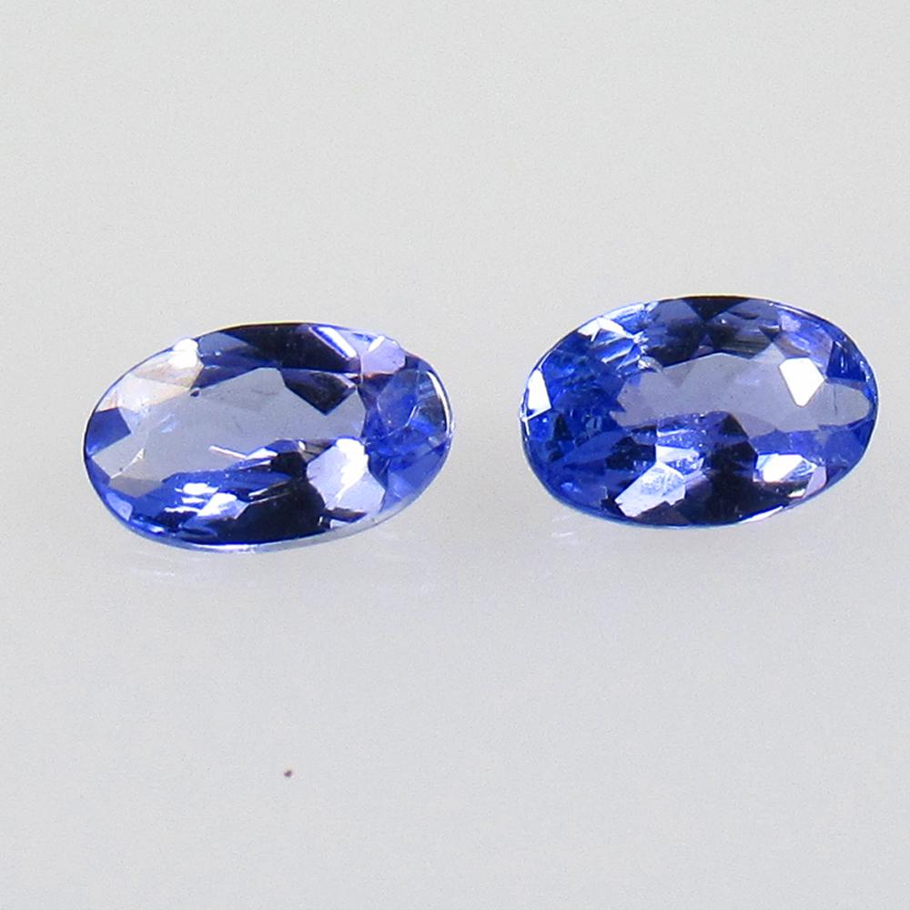 0.48 Ctw Natural Tanzanite Oval Pair: No Reserve! Title: 0.48 Ctw Natural Tanzanite Oval Pair Stone Clarity: VVS Gemstones: Natural Tanzanite Carat Weights: 0.48 Size/Dimensions: 5.00 x 3.20 x 2.00 mm / 2 P'cs Additional Information: Top 