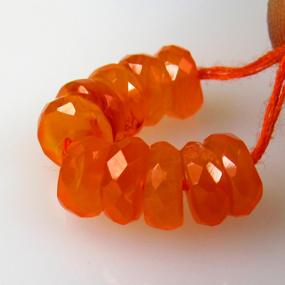 8.90 Ctw Natural 10 Drilled Orange Carnelian Round Beads: No Reserve! Title: 8.90 Ctw Natural 10 Drilled Orange Carnelian Round Beads Stone Clarity: Semi-Transparent Gemstones: Natural Carnelian Beads Carat Weights: 8.9 Size/Dimensions: 6.20 - 6.60 mm / 10 P