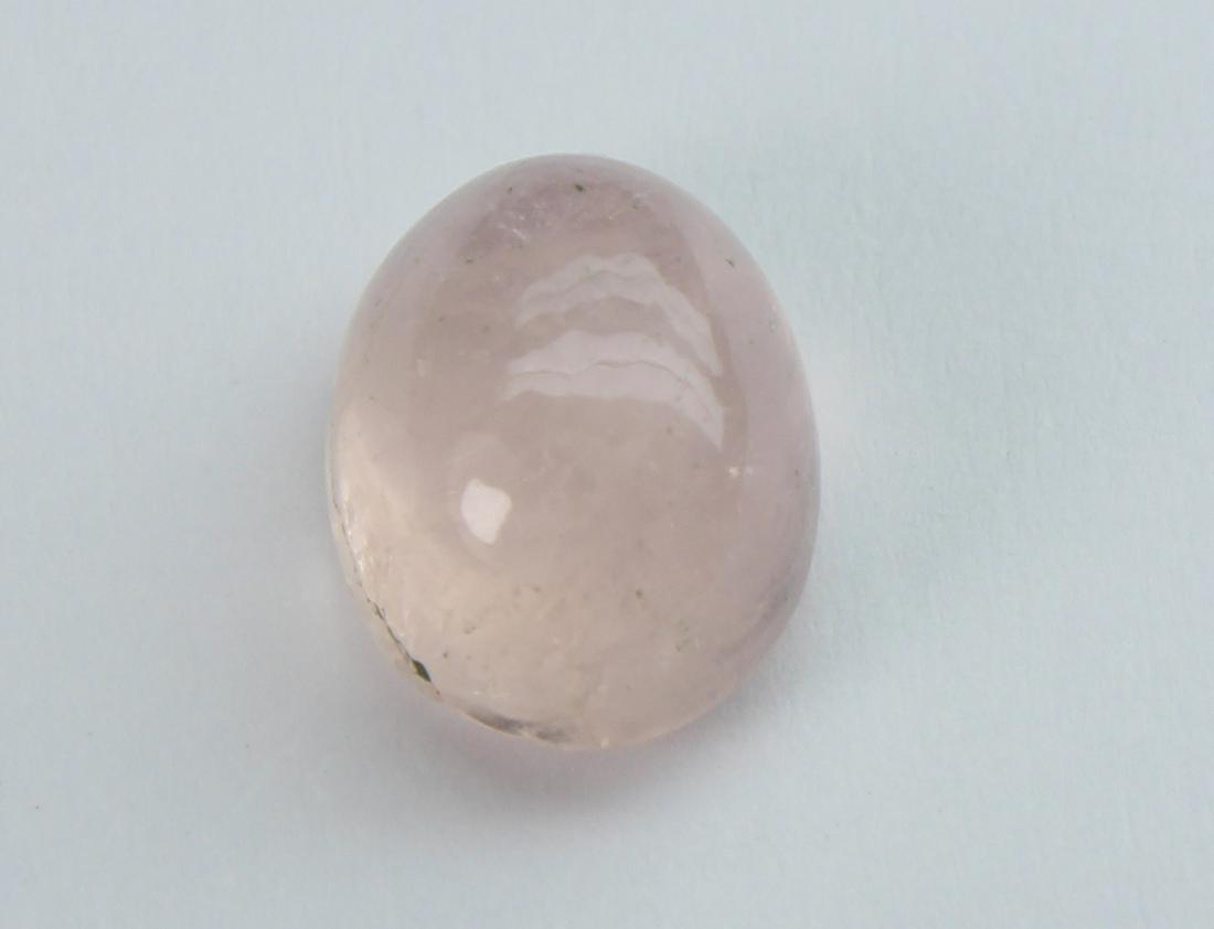 3.04 cts Natural Morganite: No Reserve! Title: 3.04 cts Natural Morganite Additional Information: Gemstone : Natural Morganite Shape and Cut : Oval Cabochon Weight : 3.04 carats Measurements : 9.69x7.50x5.54 mm Color : Peach Tra