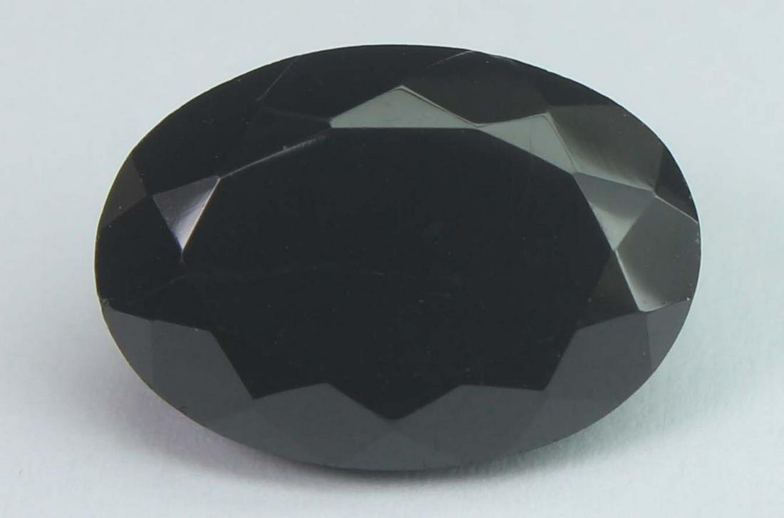 7.84 Cts Natural Black Spinel: No Reserve! Title: 7.84 Cts Natural Black Spinel Additional Information: Gemstone : Natural Black Spinel Shape and cut : Oval Cut Origin : Africa Weight : 7.84 carats Measurements : 14x10 mm , Color :