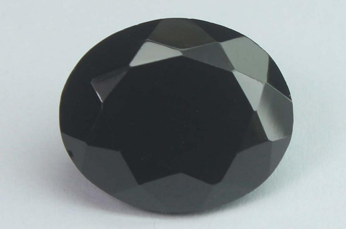 5.70 Cts Natural Black Spinel: No Reserve! Title: 5.70 Cts Natural Black Spinel Additional Information: Gemstone : Natural Black Spinel Shape and cut : Oval Cut Origin : Africa Weight : 5.70 carats Measurements : 12x10 mm , Color :
