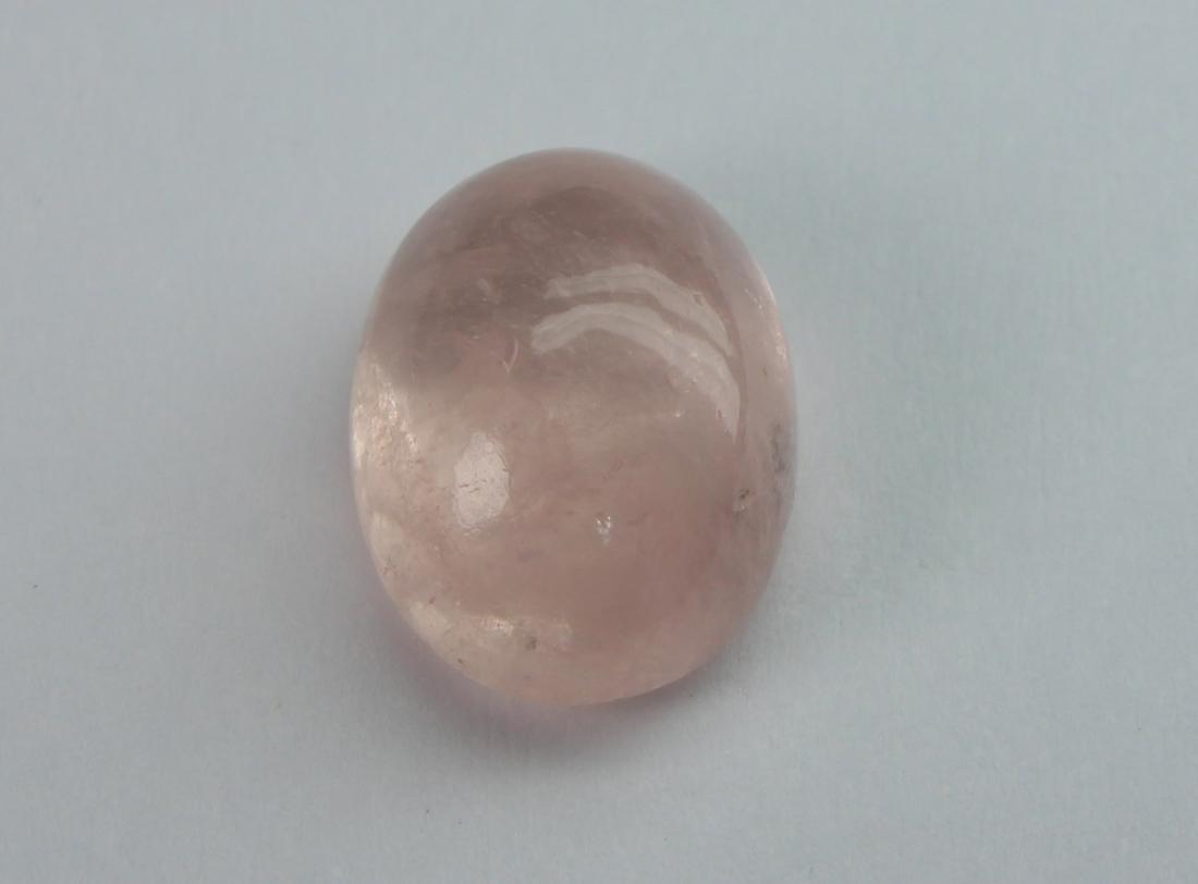 4.85 cts Natural Morganite: No Reserve! Title: 4.85 cts Natural Morganite Additional Information: Gemstone : Natural Morganite Shape and Cut : Oval Cabochon Weight : 4.85 carats Measurements : 12.40x9.06x6.04 mm Color : Peach Tr