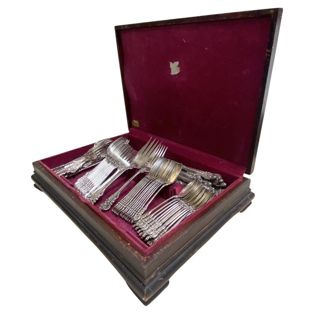 Set of 12 Wallace Grande Baroque Sterling Silver Flatware with Orignal Canteen: Details Creator Wallace Silversmiths (Manufacturer) Dimensions Height: 9 in (22.86 cm)Width: 1 in (2.54 cm)Depth: 1 in (2.54 cm) Sold As Set of 63 Style Baroque (In the Style Of) Materials and Techniq