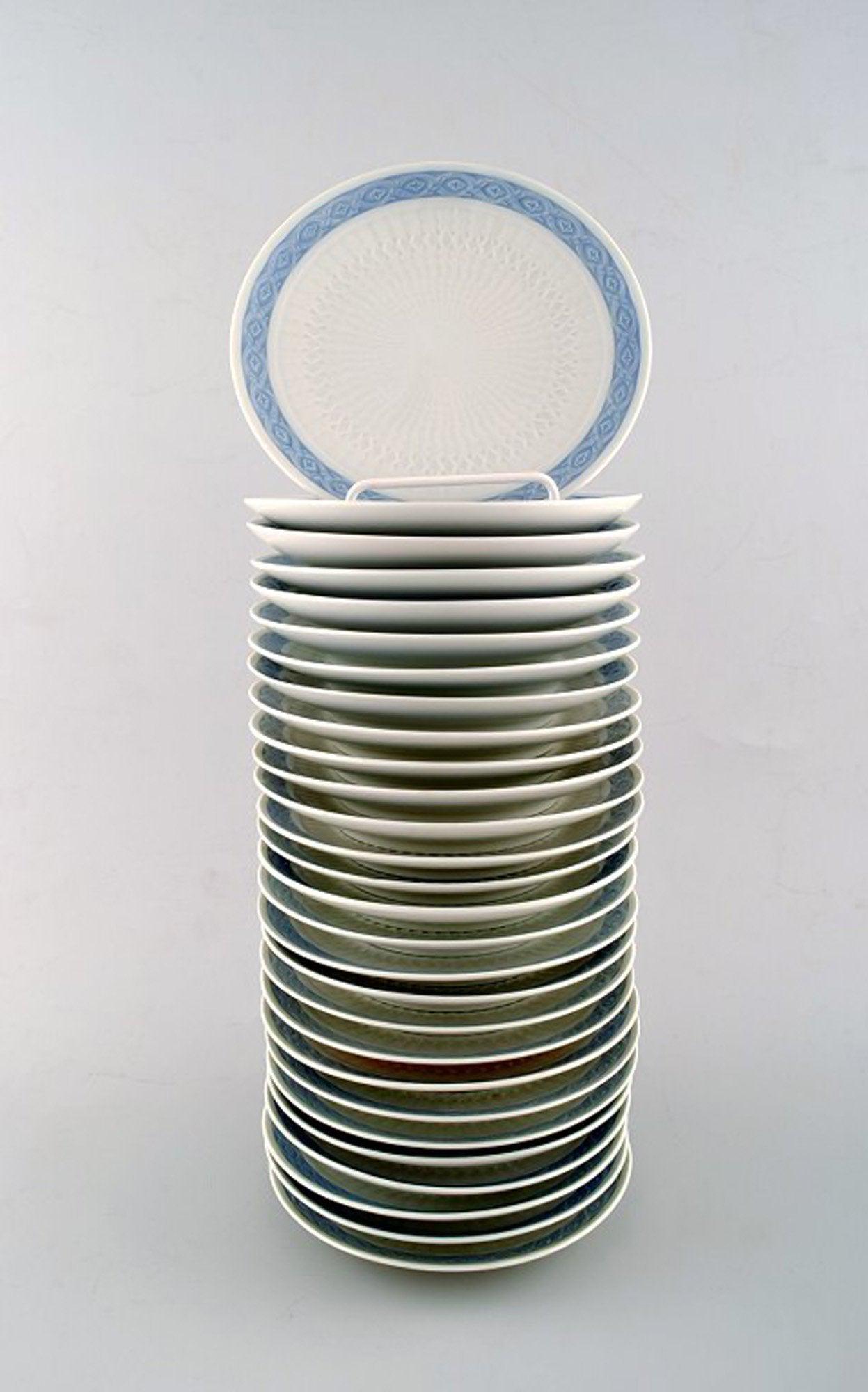 Royal Copenhagen Blue fan, bread & butter plates. 28 pcs. in stock.: 28 plates. Royal Copenhagen Blue fan, bread & butter plates. Designed by Arnold Krog in 1909. Decoration Number 1212/11533. Diameter 16 cm. In Perfect condition, 1st. factory quality. Reserve: $21.00