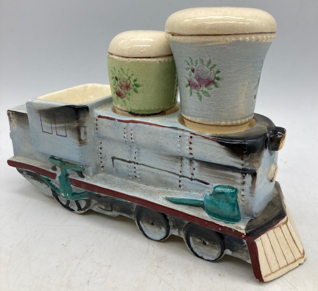 Vintage Locomotive Train Salt Pepper Japan: Title: Vintage Locomotive Train Salt Pepper Japan Date/Period: approx 1950-60's Dimension: approx 6" long Material: ceramic Additional Information: Vintage Locomotive Train Salt Pepper Japan Shipping: