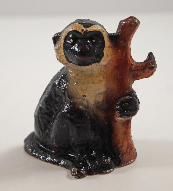 Monkey by Branch Cast Iron Bottle Opener: Monkey by Branch cast iron Vintage Bottle Opener. Paint variation, black monkey. Made by John Wright. Ca. 1947. Excellent condition with original paint. 2 5/8” tall x 2 1/4” wide. Shipping
