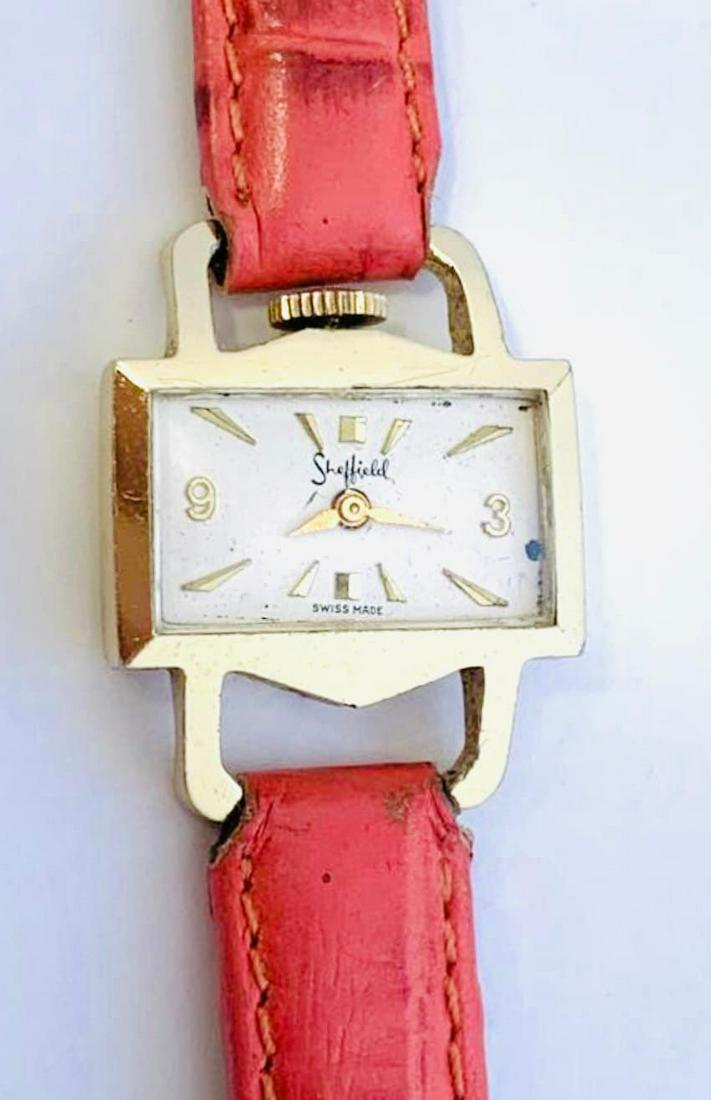 Vintage ladies wristwatch 1950â€™s: Vintage from the 1950s Band material: Leather Style: Mid-century Description Sheffield ladies 60’s wristwatch with Gruen 17 jewel movement White face with 50’s style numerals Watch is 7 3/