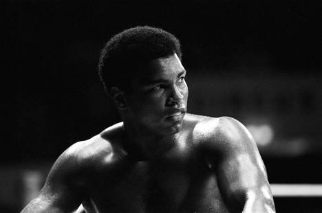 Muhammad Ali' 1976 ( Galerie Prints Limited Edition) 1976: Muhammad Ali' 1976 Muhammad Ali at his training camp ahead of his fight with Richard Dunn in Munich, 23rd May 1976. (photo Mirror Trinity Group Archives) A stunning portrait of the legendary boxer, wi