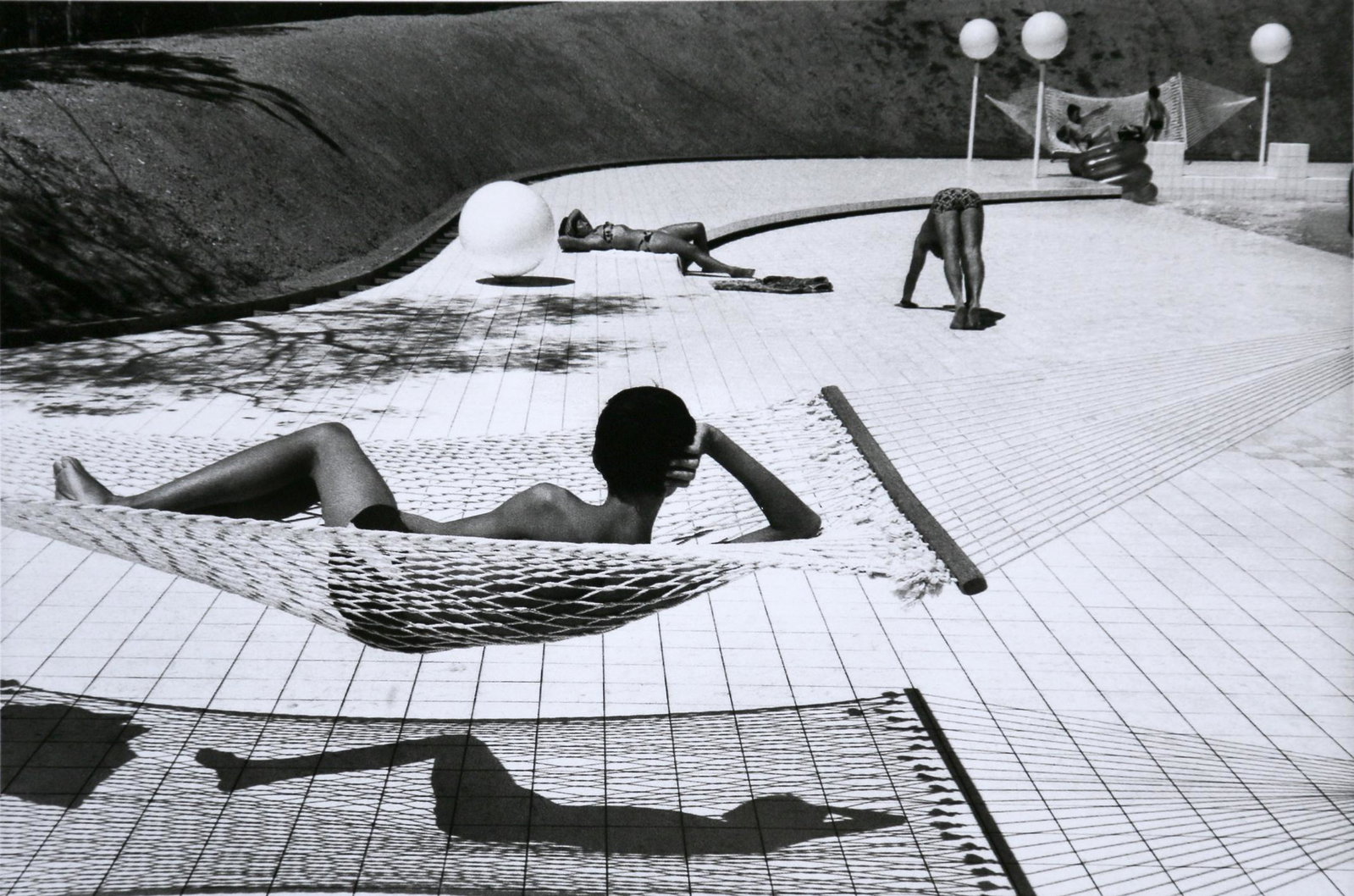 Martine Franck: Town of Le Brusc. Pool designed by Alain CAPEILLERES, 1976: Artist: Martine Franck Title: Town of Le Brusc. Pool designed by Alain CAPEILLERES, 1976 Date Printed: 2008 Medium: Photo Litho with Copyright Martine Frack / Magnum Photos Print Origin: Italy Dimensi
