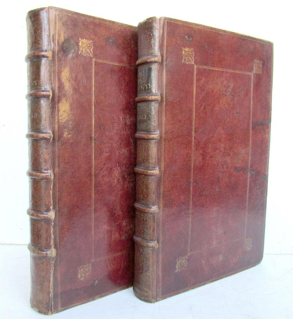 1703 LIVES OF SAINTS 2 LARGE FOLIO VOLUMES in FRENCH Les Vies des Saints ANTIQUE: Les Vies des Saints by Francois Girt Paris: Pierre Debats, 1703 two volumes Large folios: 10.5 by 16" Weight about 17 lbs bound in full leather, covers with gilt ruling, spines with gilt lettering and