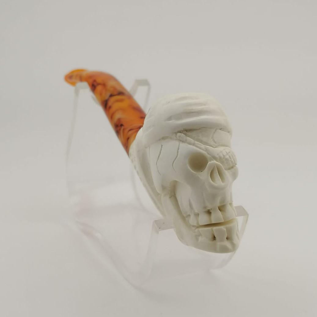 Pirate Skull Meerschaum Pipe: Title: Pirate Skull Meerschaum Pipe Materials: Meerschaum Dimension: 5.7 inch (14.5cm) Additional Information: Pirate Skull,Hand carved Meerschaum Pipe. Made in Turkey,Eskisehir by Meerschaum Carve Ma