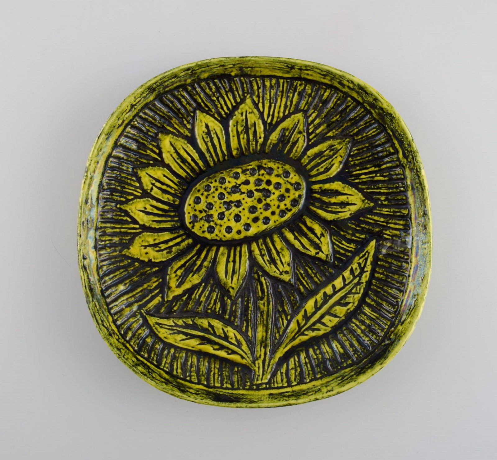 Gunnar Nylund for Rörstrand. Round dish / bowl in glazed ceramics. Incised sunflower on yellow (1 of 5)