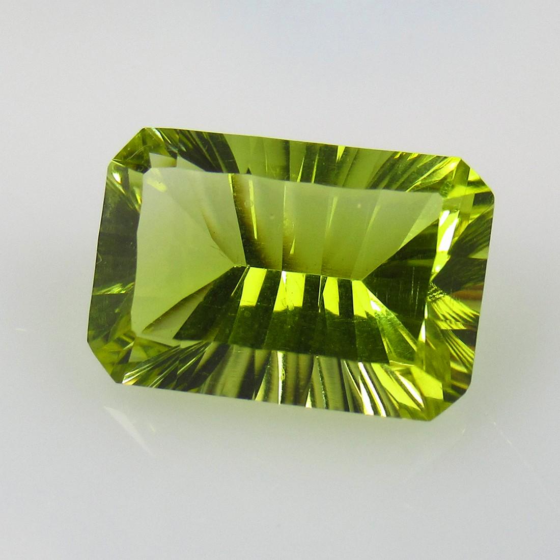7.31 Ctw Natural Lemon Quartz Concave Cut: No Reserve! Title: 7.31 Ctw Natural Lemon Quartz Concave Cut Stone Clarity: VVS Gemstones: Natural Lemon Quartz Carat Weights: 7.31 Size/Dimensions: 14.70 x 9.80 x 7.30 mm Additional Information: Top 