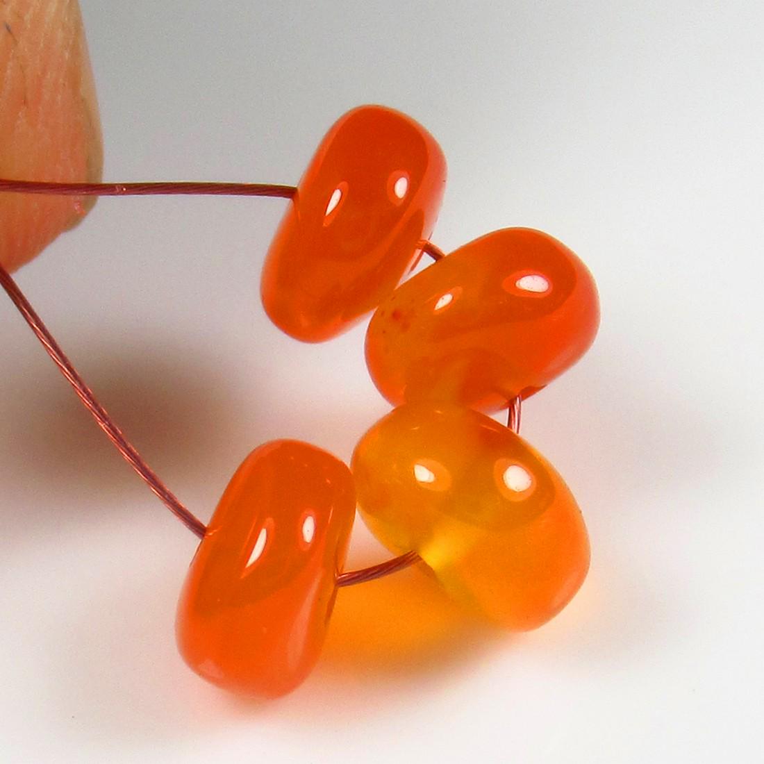 Natural Carnelian Beads - 5.77 Ct: No Reserve! Title: Natural Carnelian Beads - 5.77 Ct Origin: Brazil Weight: 5.77 Size/Dimensions: 6.5 - 7.0 mm Additional Information: Pieces : 4 No's / Shape : Drilled Round Beads / Color : Orange / 