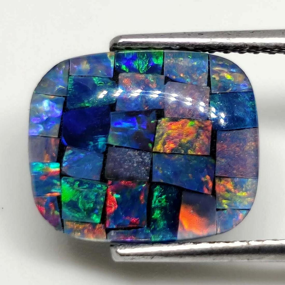 3.20 ct Australian Doublet Opal: No Reserve! Title: 3.20 ct Australian Doublet Opal Additional Information: Gemstones: Australian Doublet Opal Carat Weights: 3.20 ct Size/Dimensions: 12 X 10 X 3 mm Materials & Techniques: Opal Shippi