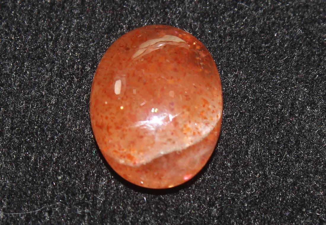 5.19 Cts Natural Sunstone: No Reserve! Gemstone: Natural Sunstone Origin: Africa Weight: 5.19 Carats Dimensions: 13.27x10.30x5.28 mm Shape: Oval Cabochon Color: Orange Treatment: No Treatment Transparency: Opaque Clarity: No vi