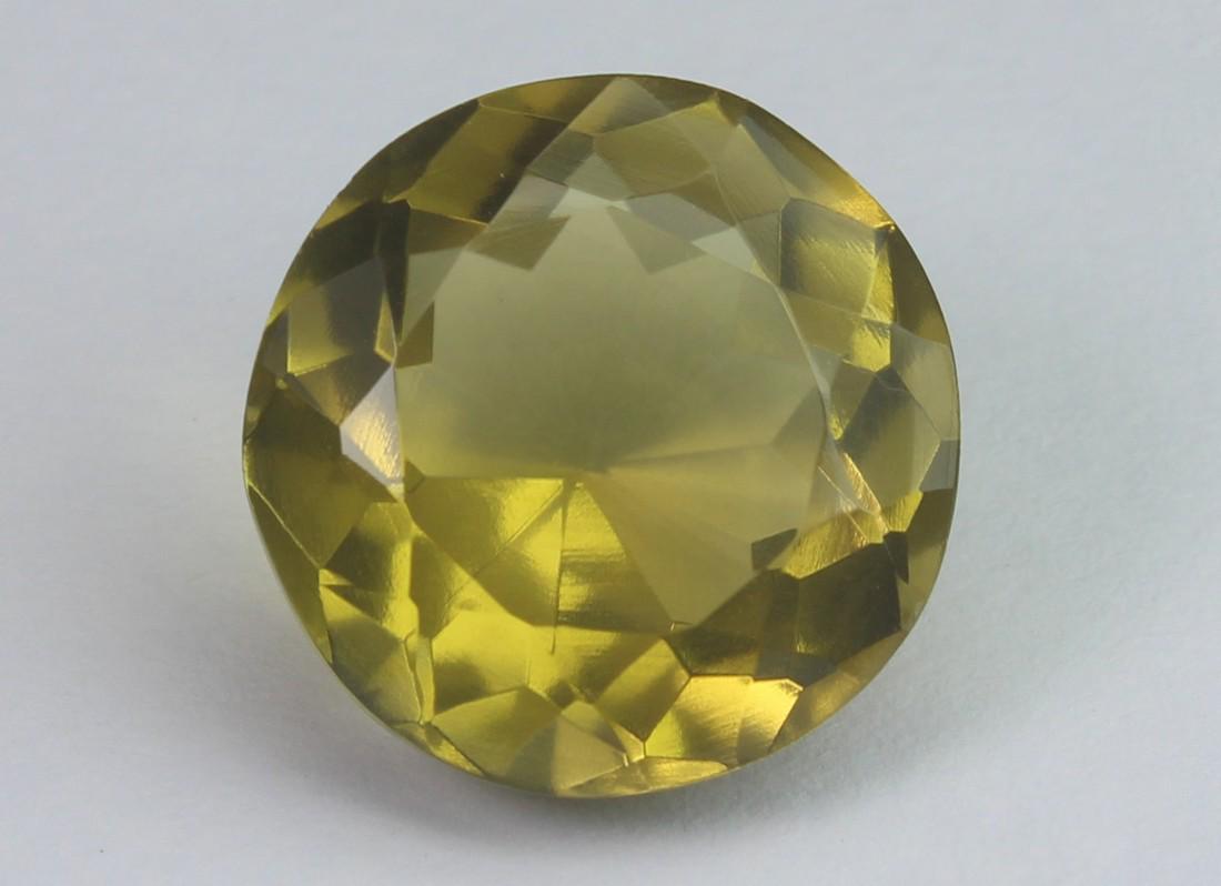 11.26 cts Natural Lemon Quartz: No Reserve! Gemstone: Natural Lemon Quartz Origin: Africa Weight: 11.26 carats Measurements: 14.47-14-47x9.32 mm Shape / Cut: Round Cut Colour: Yellow Transparency: transparent Treatment: No Treatment