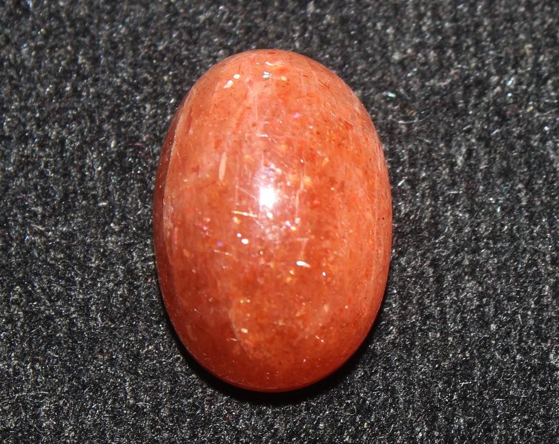 7.10 Cts Natural Sunstone: No Reserve! Gemstone: Natural Sunstone Origin: Africa Weight: 7.10 Carats Dimensions: 13.95x9.73x6.98 mm , Shape: Oval Cabochon Color: Orange Treatment: No Treatment Transparency: Opaque Clarity: No v