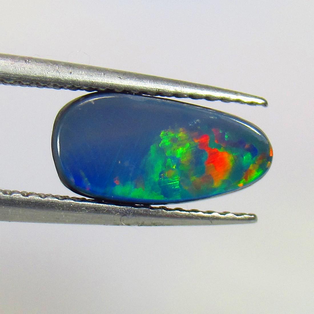 2.06 Ctw Natural Australian Doublet Opal Pear Cabochon: No Reserve! Title: 2.06 Ctw Natural Australian Doublet Opal Pear Cabochon Stone Clarity: Opaque Gemstones: Natural Australian Opal Carat Weights: 2.06 Size/Dimensions: 11.50 x 5.60 x 3.10 mm Additiona