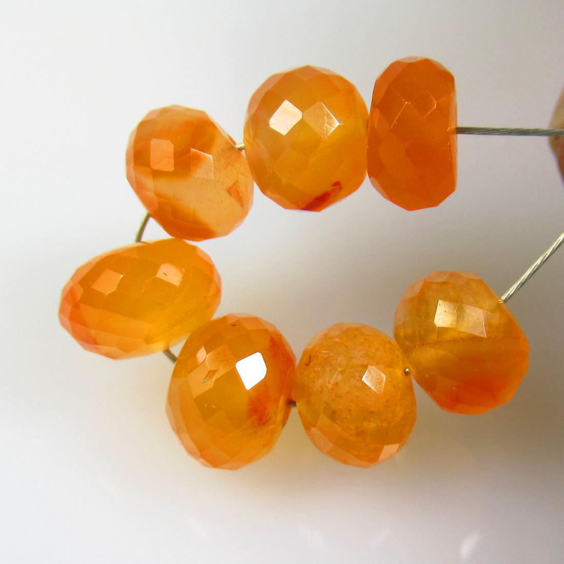 9.37 Ctw Natural 7 Drilled Orange Carnelian Round Beads: No Reserve! Title: 9.37 Ctw Natural 7 Drilled Orange Carnelian Round Beads Stone Clarity: Semi-Transparent Gemstones: Natural Carnelian Beads Carat Weights: 9.37 Size/Dimensions: 6.20 - 7.00 mm / 7 PC