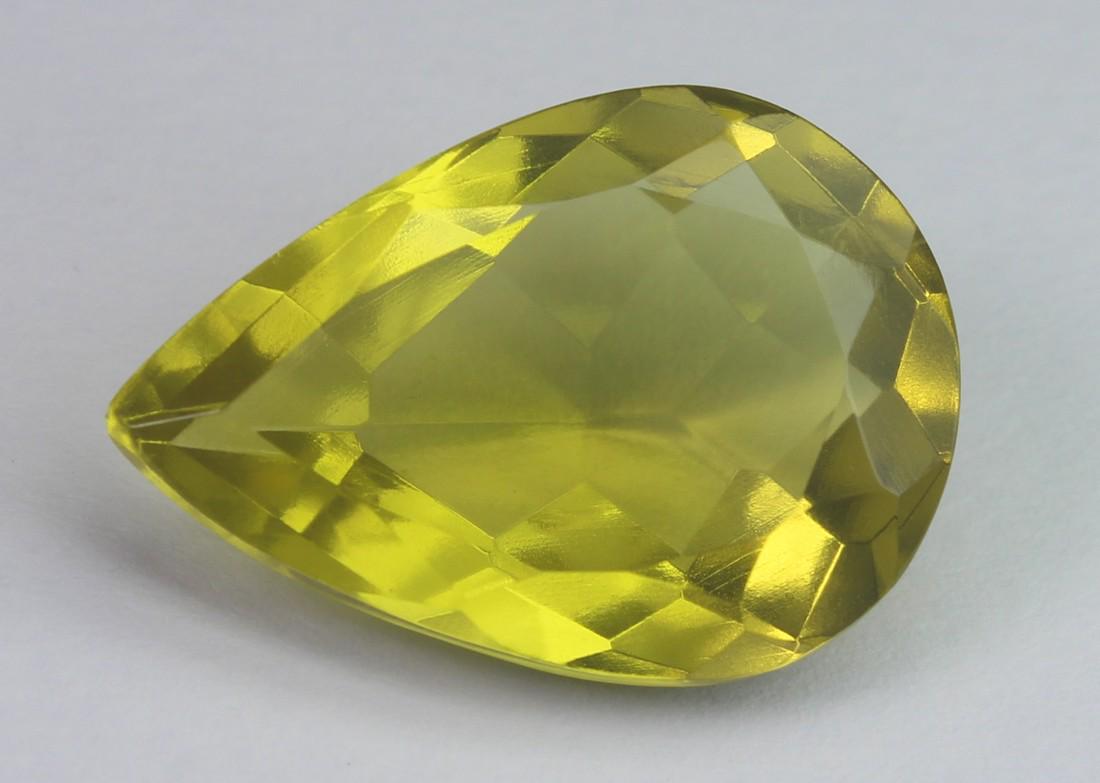 12.78 cts Natural Lemon Quartz: No Reserve! Gemstone: Natural Lemon Quartz Origin: Africa Weight: 12.78 carats Measurements: 20.50x14.42x7.96 mm Shape / Cut: Pear Cut Colour: Yellow Transparency: transparent Treatment: No Treatment 