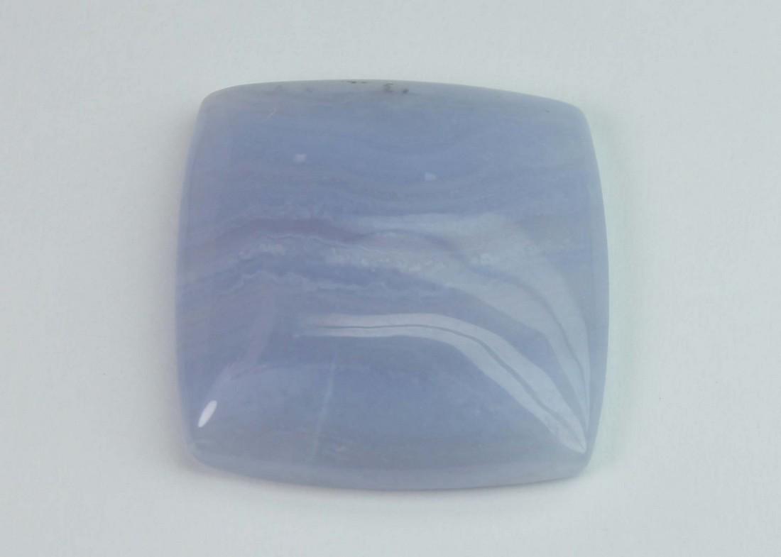 22 Ct Natural Blue Lace Agate: No Reserve! Gemstone: Blue Lace Agate Shape and cut: Square Cabochon Origin: Namibia Weight in carats : 22 Measurements: 20.42x20.32x5.55 mm Color: Bluish with White pattern Transparency: Translucent