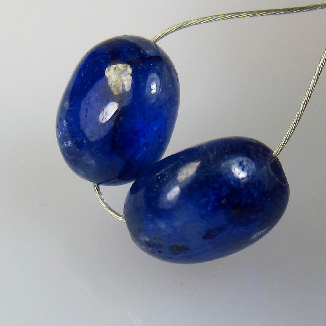 6.44 Ctw Natural 2 Drilled Blue Sapphire Dumble Beads: No Reserve! Title: 6.44 Ctw Natural 2 Drilled Blue Sapphire Dumble Beads Stone Clarity: Transparent Gemstones: Natural Sapphire Beads Carat Weights: 6.44 Size/Dimensions: 8.50 x 6.70 x 6.30 mm / 2 Pc'