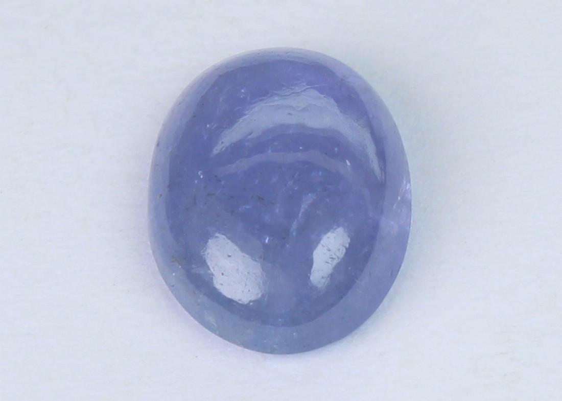2.03 Cts Natural Tanzanite: No Reserve! Gemstone: Natural Tanzanite Shape and cut: OvalCabochon Weight: 2.03 Carats Measurements: 9.32x7.30x3.22 mm Color: Violetish Blue Transparency: Transparent Treatment: No Treatment Origin: 