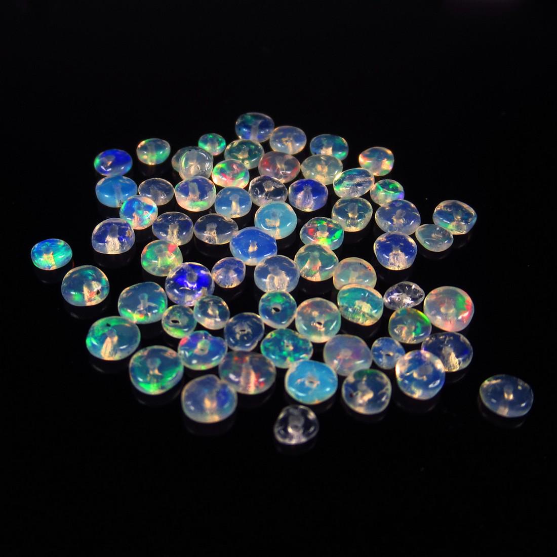 Natural Multicolor Opal Beads - 4.46 Ct: No Reserve! Title: Natural Multicolor Opal Beads - 4.46 Ct Origin: Ethiopia Weight: 4.46 Size/Dimensions: 2.5 - 3.3 mm Additional Information: Pieces : 67 No's / Shape : Drilled Round Beads / Clarity 