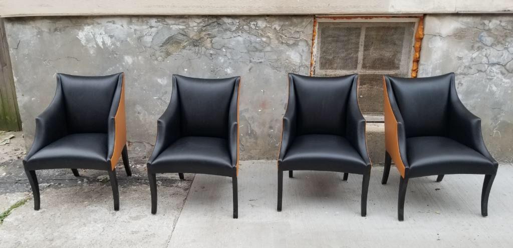 John Hutton for Donghia Two Toned Serpentine Armchairs - Set of 4: Vintage from the 1980s Materials: leather, wood Description Vintage John Hutton for Donghia Two Toned Serpentine Armchairs - Set of 4 The outside of the chairs are upholstered in a soft buttery Tabacc