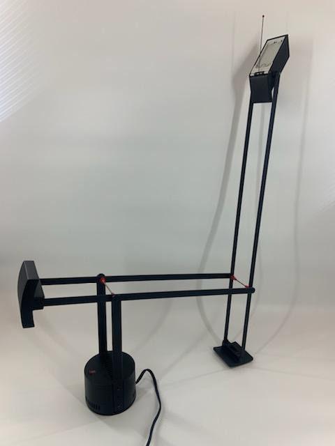 TIZIO Classic Black Desk Lamp By Richard Sapper For Artemide: Vintage from the 1970s Materials: Metal Description Vintage TIZIO Classic Black Desk Lamp By Richard Sapper For Artemide Takes Halogen Bulbs Circa 1970 H 26 W 31” L 42.5” Good vintage cond