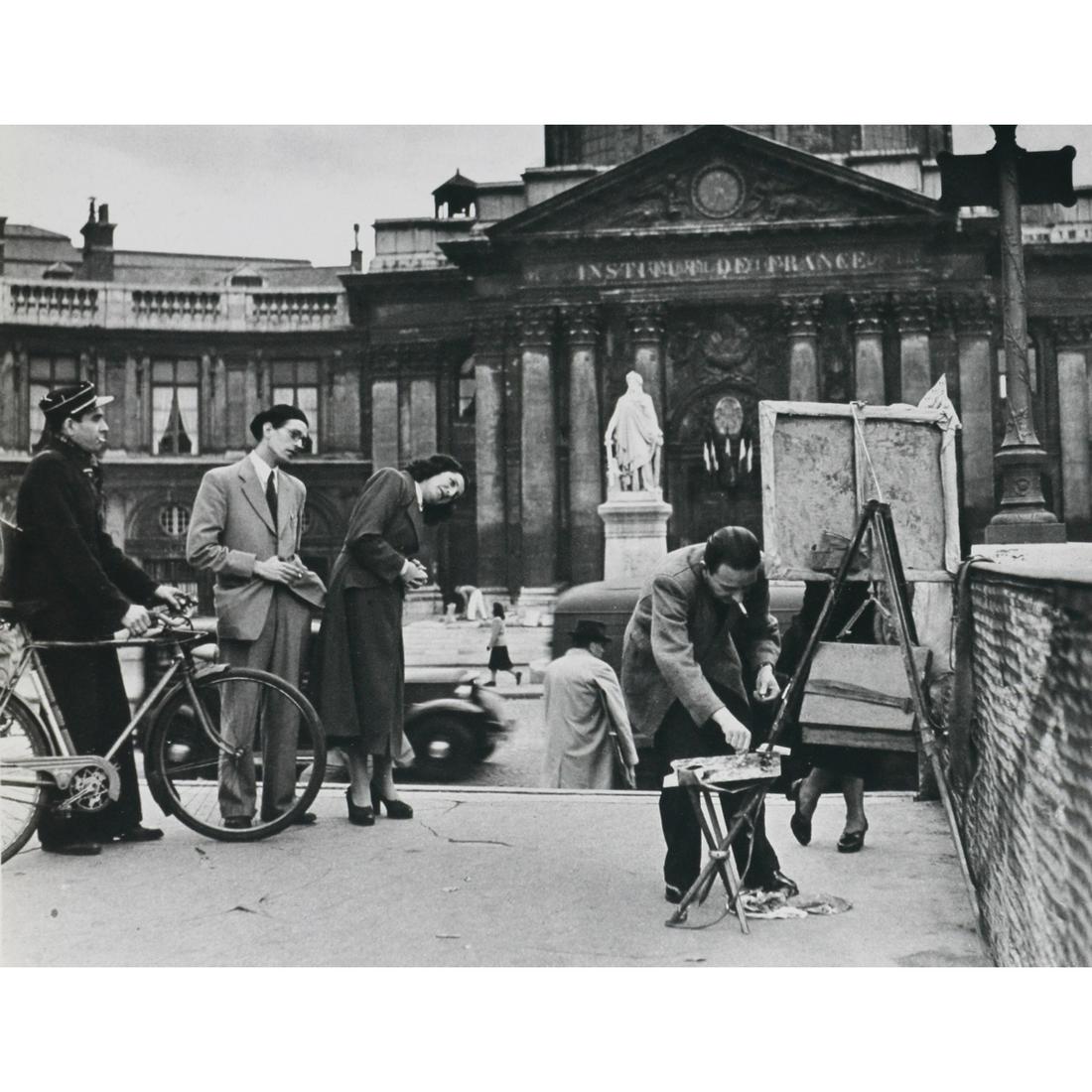 ROBERT DOISNEAU - Passerelle des Arts, 1950: Artist: ROBERT DOISNEAU Print Title: Passerelle des Arts, 1950 Medium: Sheet-fed Gravure Printing Date: 1980's Printed in Spain Image size approx. 6.5 X 8.5 inches Robert Doisneau (1912-1994) was a Fr
