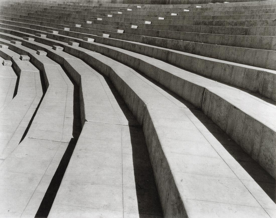 TINA MODOTTI - Stadium, Mexico City, 1927: Artist: Tina Modotti Title: Stadium, Mexico City, 1927 Medium: Photo Litho, 1999, China Dimensions: 7.1x5.65" Description: Heat Wax Mounted on 8.5x11" Conservation Board Artist Bio: Tina Modotti (1896