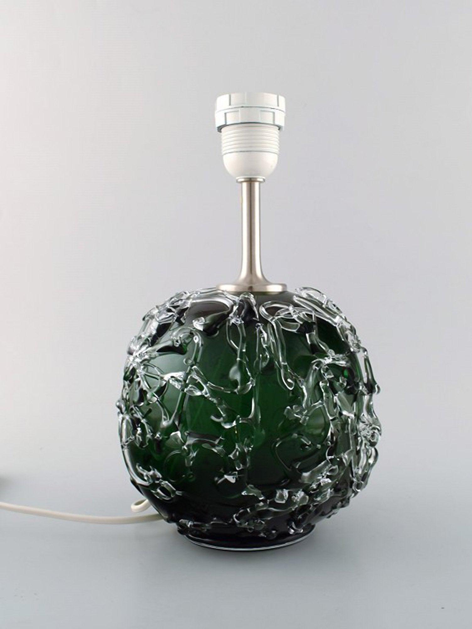 Kastrup / Holmegaard. Rare round table lamp in dark green and clear art glass. Modern design,: Title: Kastrup / Holmegaard. Rare round table lamp in dark green and clear art glass. Modern design, 1960's. Description: Kastrup / Holmegaard. Rare round table lamp in dark green and clear art glass.