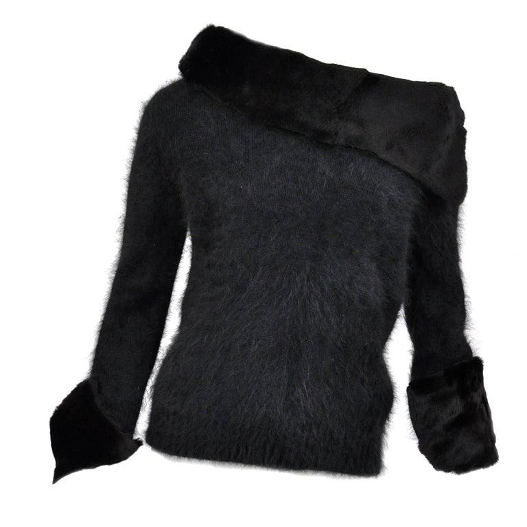 A/W 2001 Vintage Tom Ford for Gucci Black Angora and Mink Fur Sweater: Autumn/Winter 2001 THE MOST LUXURIOUS GUCCI SWEATER EVER! Highly sought after GUCCI SWEATER by TOM FORD Extremely RARE ! In excellent condition. Made in Italy Size XS Angora and Genuine sheared mink f