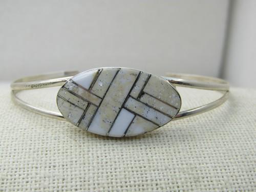 Vintage Sterling Southwestern Inlaid Cuff Bracelet, Signed Y, 6.5": Vintage Sterling Inlaid Cuff Bracelet, Signed Y, 6.5", This has a sticker on it stating it is Navajo Arnold Yazzie - it is signed Y on the back with sterling under the Y. Weight is 9.07. Measures 6.5"
