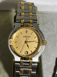 Gucci Watch 9000L Ladies Dial Quartz Two Tone Link Date Watch Extra links B484: SKU B484 0222 100% Authentic Pre-owned Gucci 9000L 25mm Ladies Two Tone Watch Rating: B...Very Good, well maintained, shows minor signs of wear EXTERIOR: some hairline scratches and minor scuff